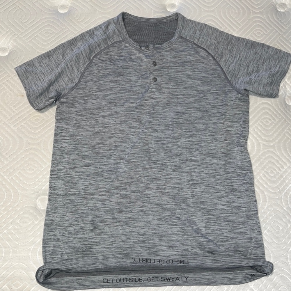 Long short sleeve medium lululemon shirt. Great condition. Static silver